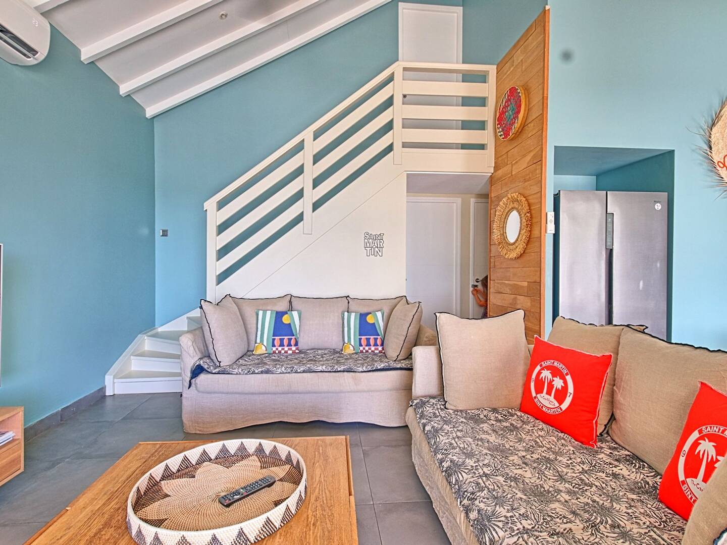 Séjour double hauteur et mezzanine